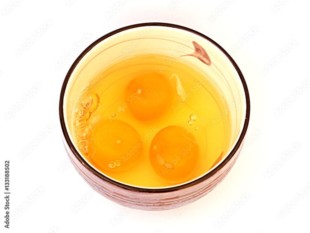 eggs in a bowl on a white background eggs in a bowl on a white background