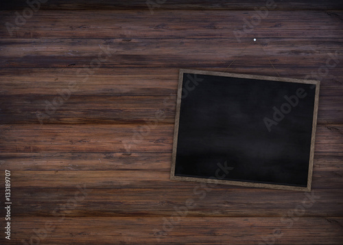 Clean chalk board on wooden wall for background.texture for educational or business background.