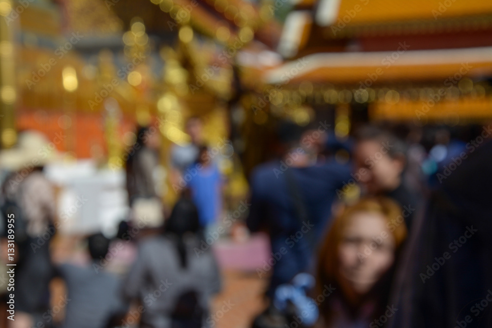 Blurred motion of people walking around  temple, Chiang Mai Thai