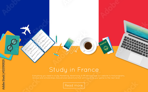 Study in France concept for your web banner or print materials. Top view of a laptop, books and coffee cup on national flag. Flat style study abroad website header.