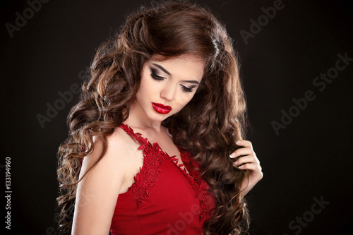 Brunette. Beauty Makeup. Long hair. Curly hairstyle. Beautiful w