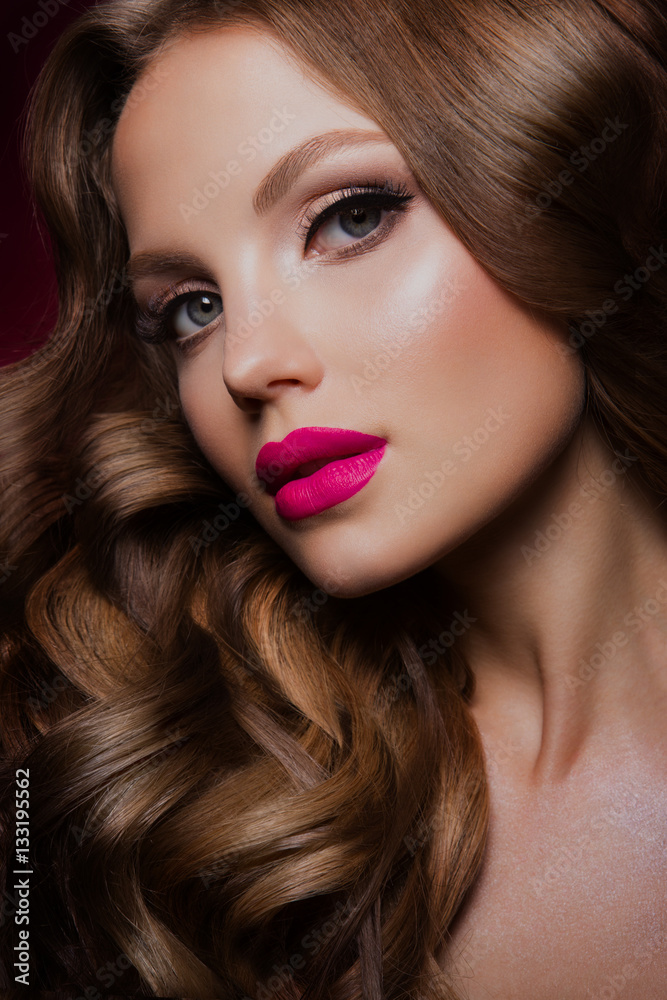 Close-up portrait of beautiful woman with bright make-up and hairstyle. Close-up portrait of beautiful woman with bright make-up and hairstyle.