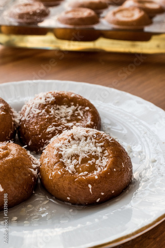 Turkish Dessert Sekerpare with coconut powder / Small cakes with sherbet © Alp Aksoy