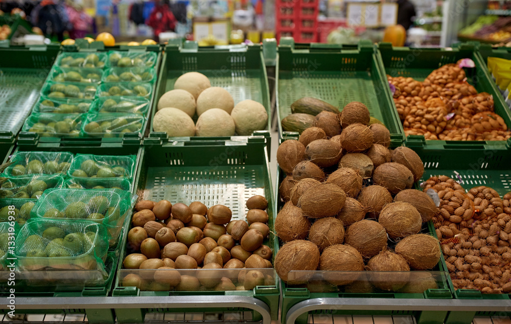fruits and vegetables on stall at grocery store
