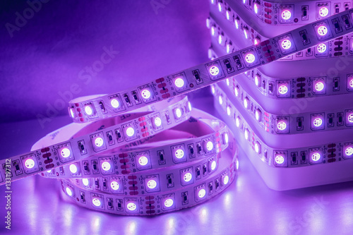 Diodes LED Strip color in the rainbow RGB stripes background blur