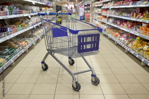 empty shopping cart or trolley at supermarket