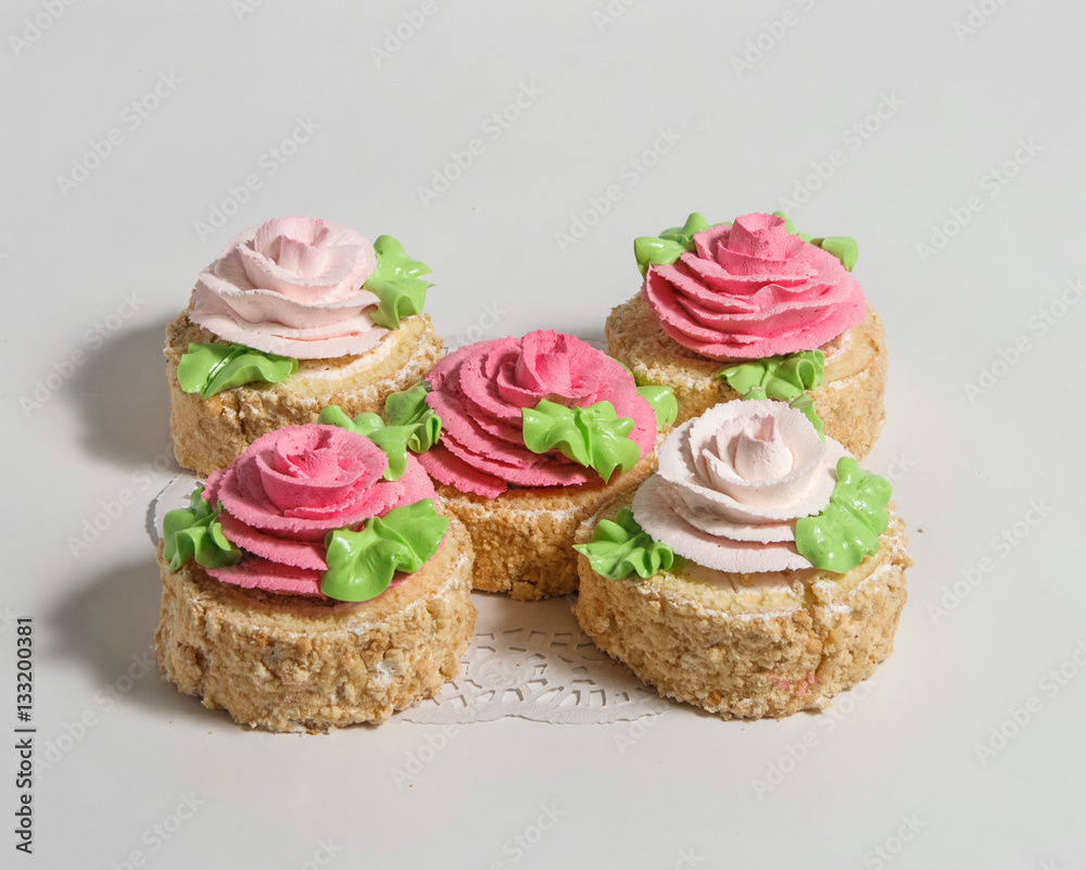 Sponge cake with cream on a white napkin. Sponge cake with cream on a white napkin.