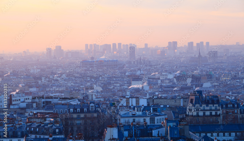 Sunset view of beautiful city of  Paris from Montmartre, France 