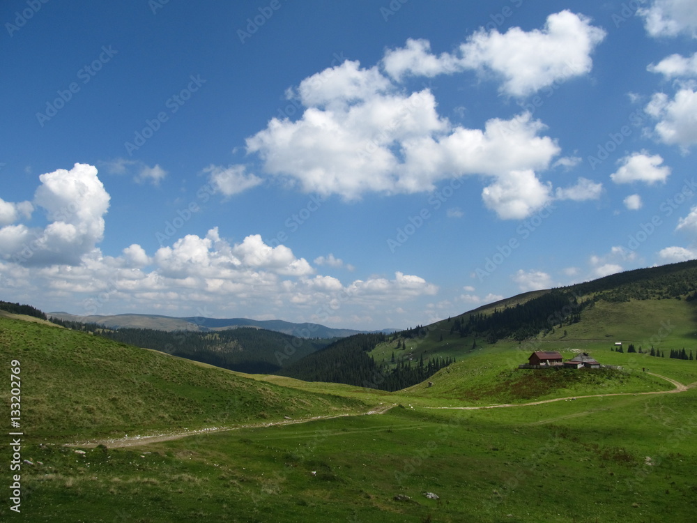 Meadow and clouds in National Park Rodna, Romania