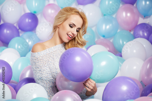 Beautiful woman with colored balloons © ZoomTeam