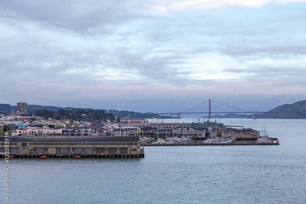 Fishermens Wharf with Golden Gate Bridge