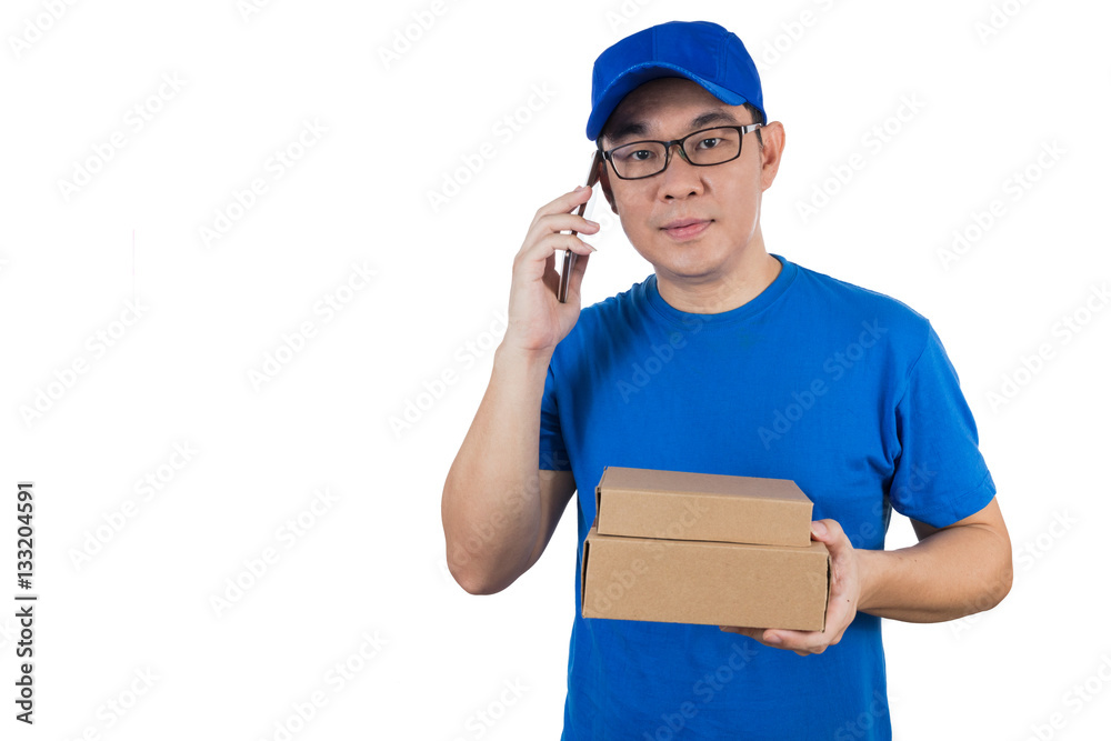 Asian Chinese delivery guy in uniform talking over mobile phone