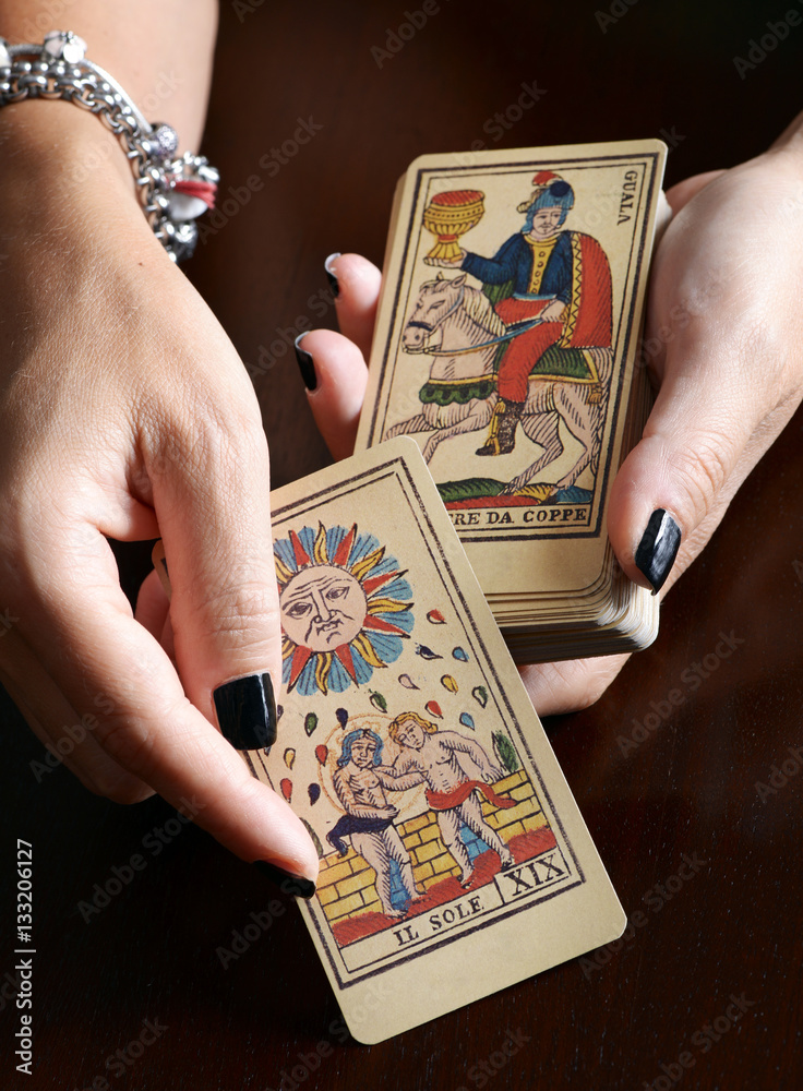 Fortune teller showing vintage tarot cards Stock Photo Adobe Stock