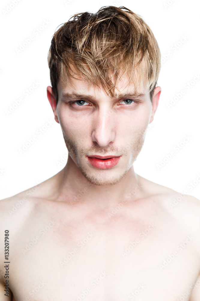 handsome shirtless young man posing in studio handsome shirtless young man posing in studio