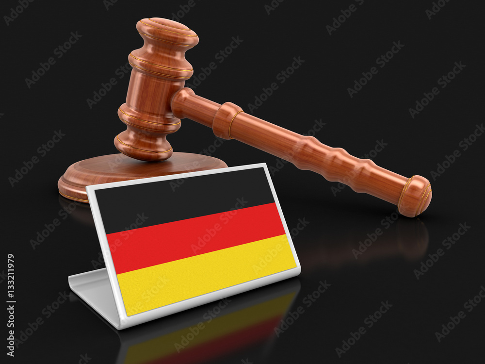 3d wooden mallet and German flag. Image with clipping path