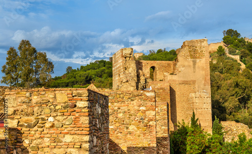 Stone walls and towers of the Alcazaba Fortress in Malaga. Spain. Andalusia.