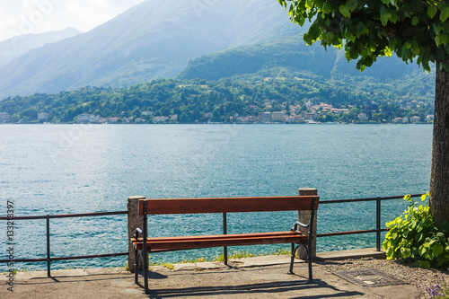 Wooden bench on Lake Como, Italy
