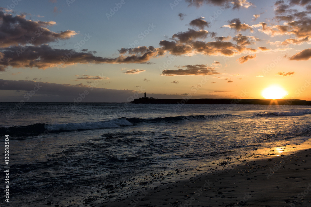 Lighthouse on Fuerteventura Canary Islands called Faro de Jandía at sunset.