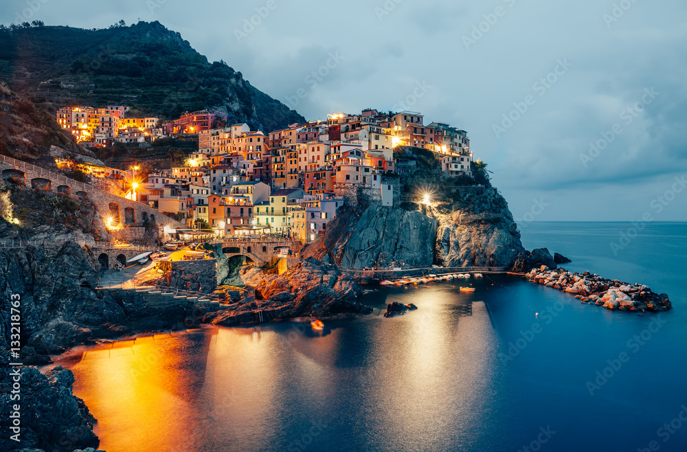 Night view of Manarola fishing village in Cinque Terre, Italy