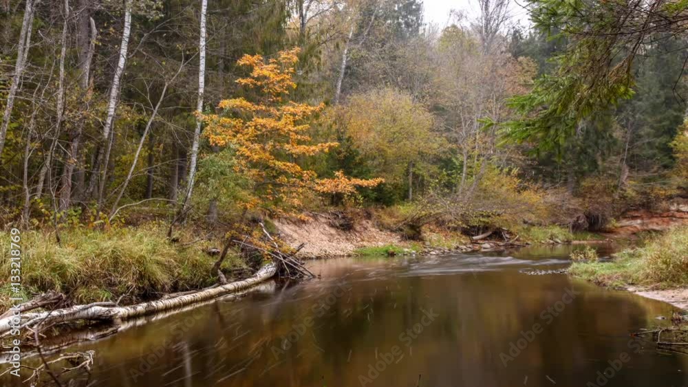 Time lapse during the river overcast autumn day. Time lapse during the river overcast autumn day.