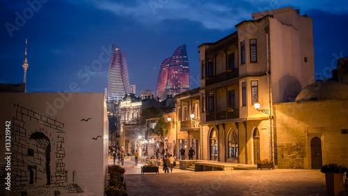 Baku, Azerbaijan - October 18, 2014: Panoramic view of Baku, from the old city looking at Flame Towers at night photo