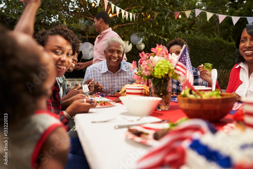 Multi generation black family at 4th July barbecue, close up