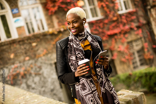 Pretty young black woman wi...