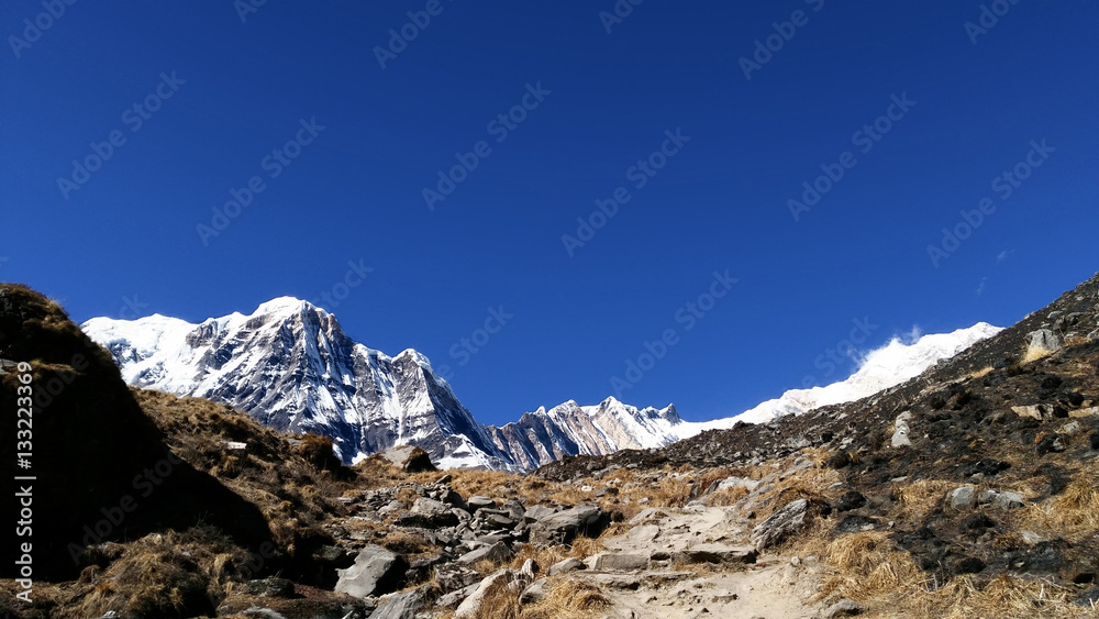 Mountain peaks with blue sky background in Nepal