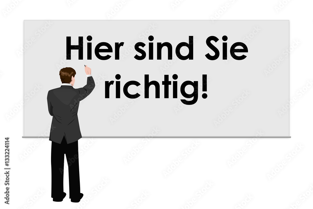 Geschäftsmann schreibt Hier sind Sie richtig Geschäftsmann schreibt Hier sind Sie richtig