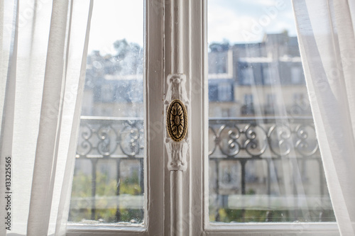 Schilderij op canvas Light Sunny Window of Paris Balcony