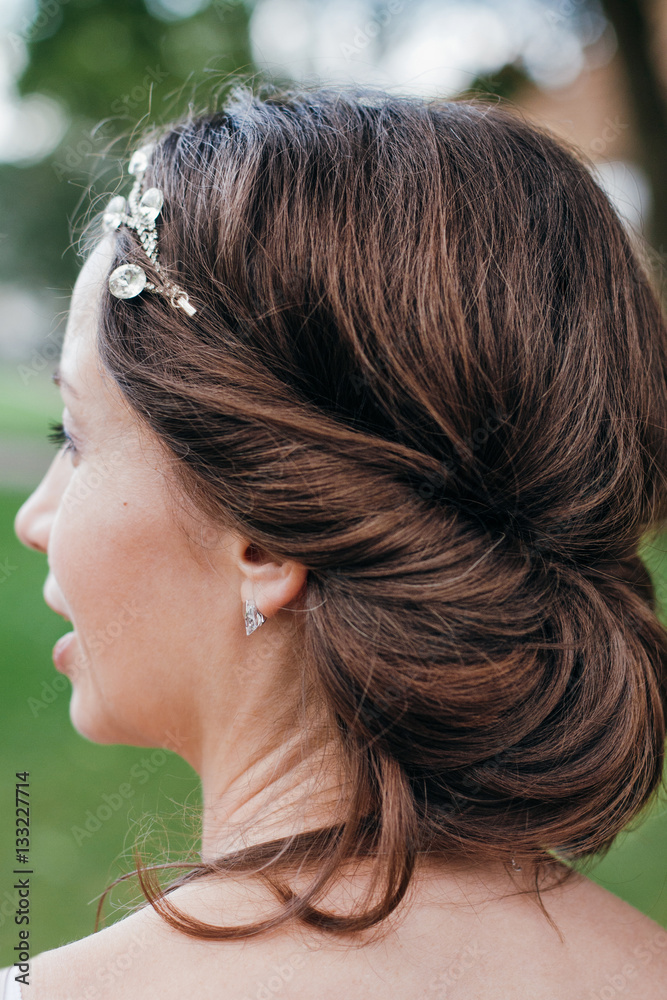 Portrait of a beautiful woman with creative hairstyle shot on the location Portrait of a beautiful woman with creative hairstyle shot on the location