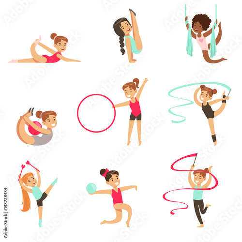 Little Girls Doing Gymnastics And Acrobatics Exercises In Class Set Of Future Sports Professionals