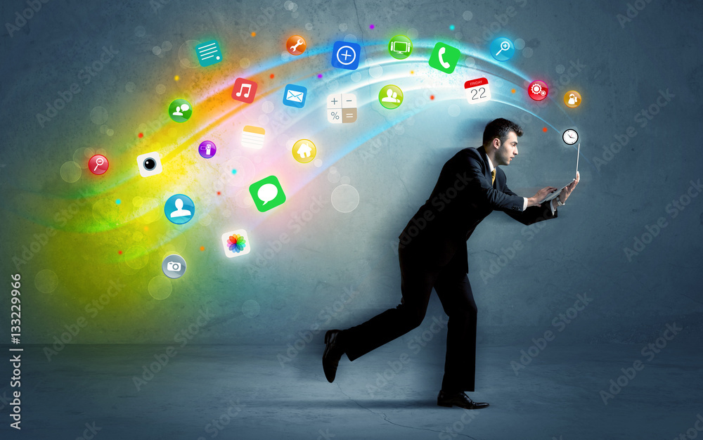 Fototapeta premium Running businessman with application icons from device