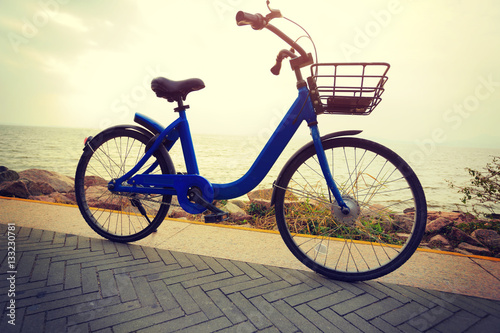 blue bike parking on seaside