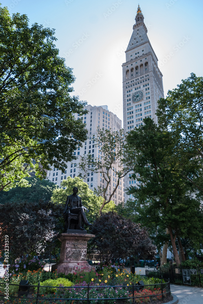 Clock tower rising over Madison Square Park, NYC