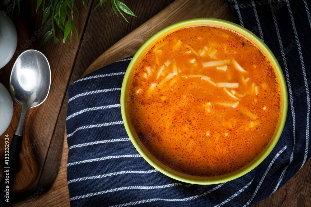 Homemade tomato soup with noodles.