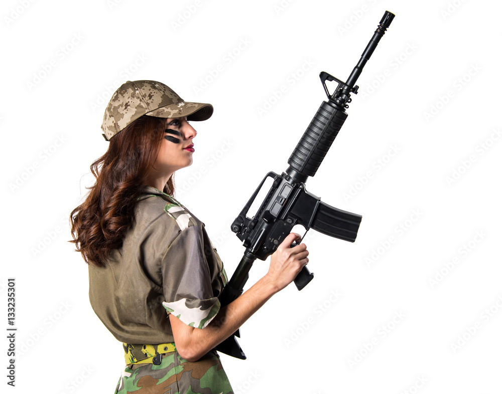 Military woman holding a rifle Military woman holding a rifle