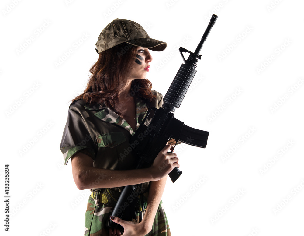 Military woman holding a rifle