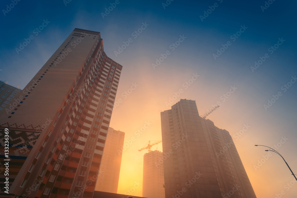 Fototapeta premium Morning fog on the modern city street.