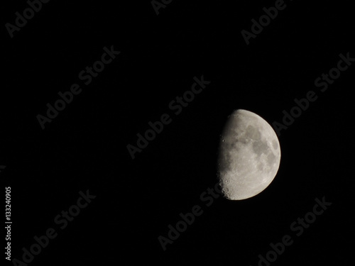 Half moon isolated on black sky