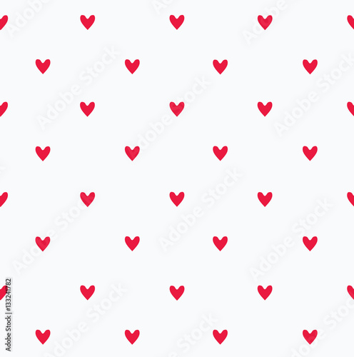 Seamless pattern with red little hearts.