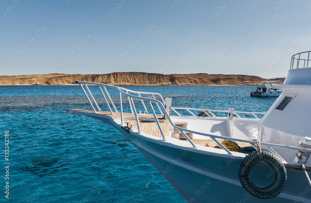 White yacht in the clear blue water ÑˆÑ‚ Sharm El Sheikh