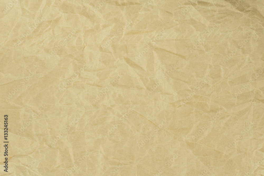Recycled crumpled light brown paper texture or paper background Recycled crumpled light brown paper texture or paper background