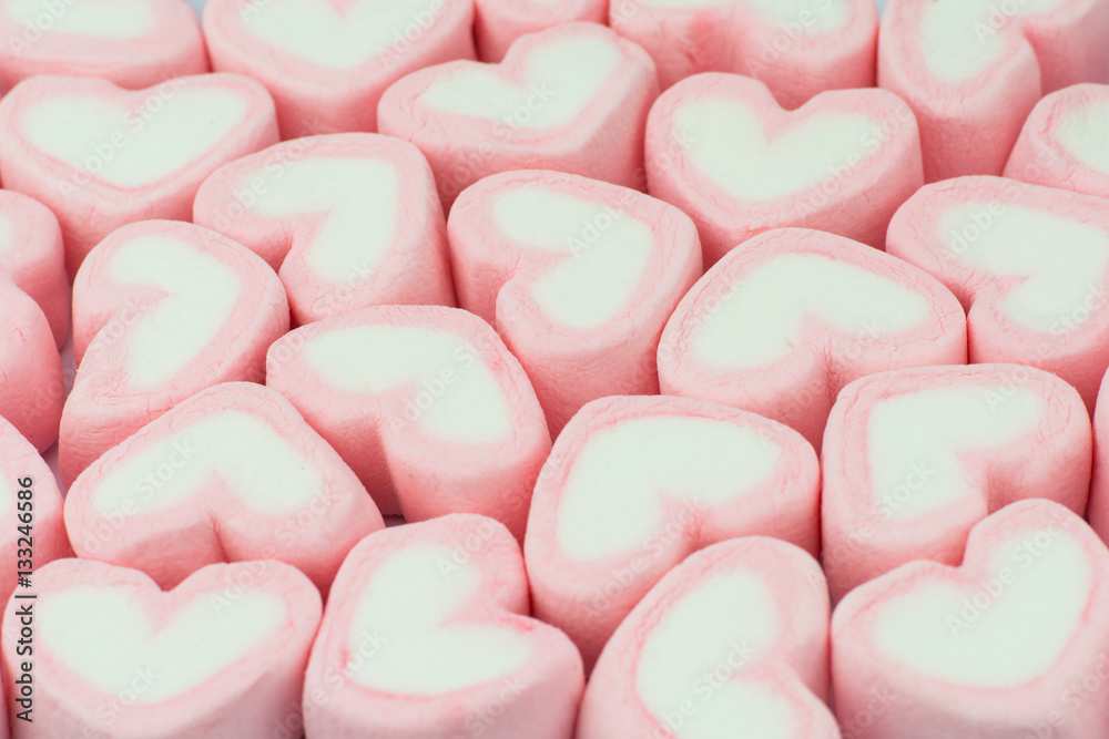 Pink heart shaped marshmallows background Pink heart shaped marshmallows background