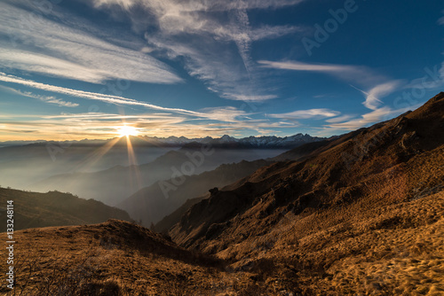 Mountain silhouette and stunning sky at sunset