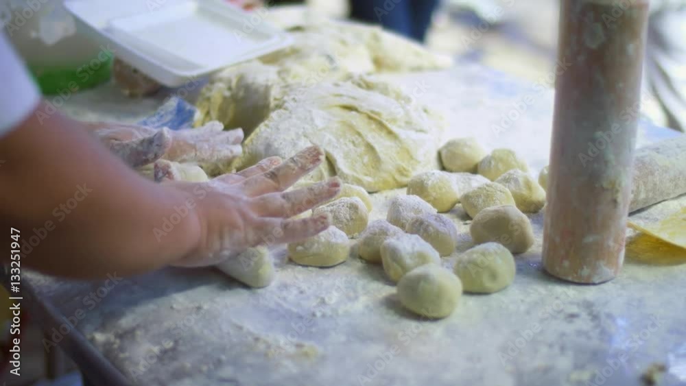 man preparing dough on asian street food festival man preparing dough on asian street food festival