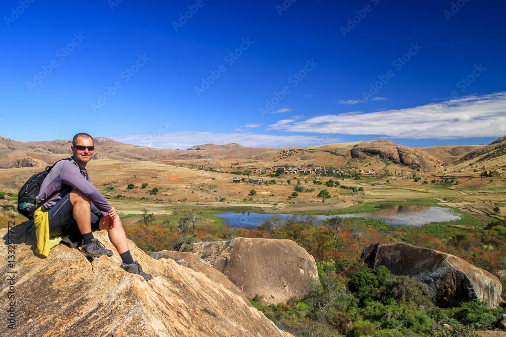 Man sitting on the rock