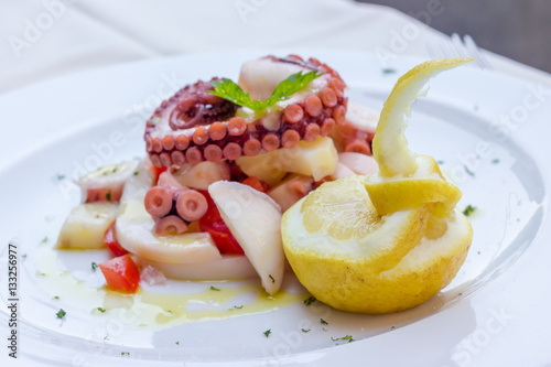 Appetizer of cuttlefish octopus and potatoes