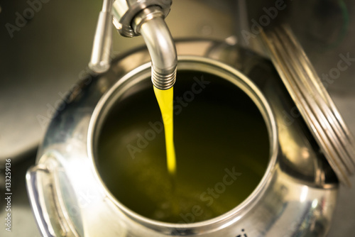 Fotografiet Processing of olive oil in a modern farm.