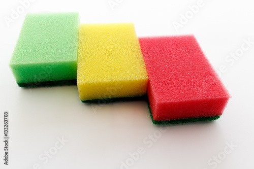 Dishwashing sponges on a white background